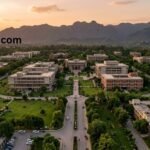 PIEAS Nilore campus aerial view at golden hour — 312-acre self-contained residential university in Islamabad
